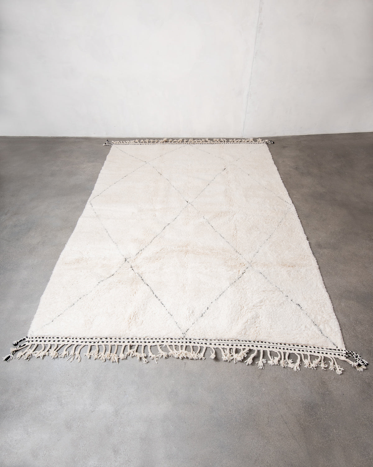 Modern, designer, handcrafted Berber rug from Morocco. Beniourain carpet with beautiful colours and patterns and fluffy wool texture.